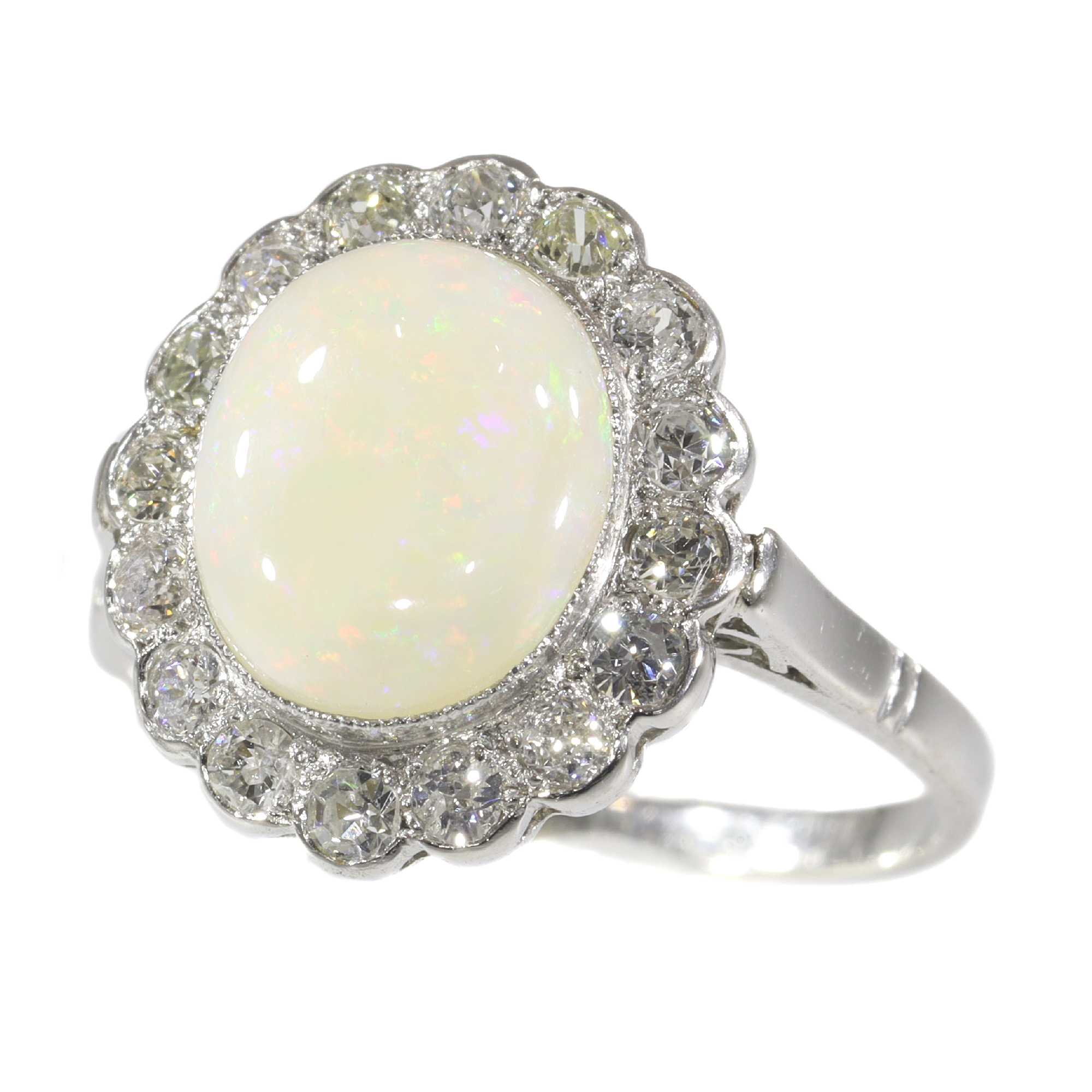 Vintage diamond and opal platinum engagement ring